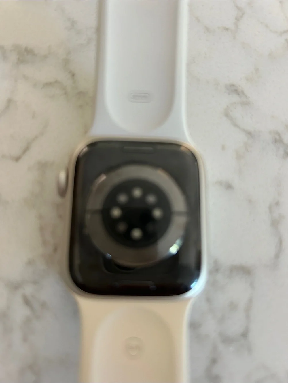 Apple Watch with White Silicone Band and Silver Case